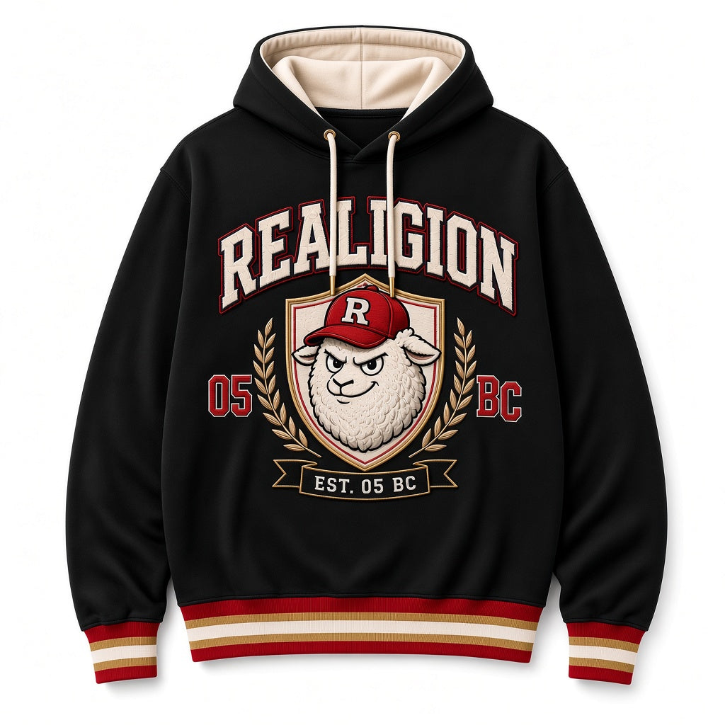 Black REALIGION Varsity Crest Hoodie with cream-lined hood, cream and red arched lettering, gold-trimmed lamb shield with laurels, Est. 05 BC banner and red, cream and gold ribbing