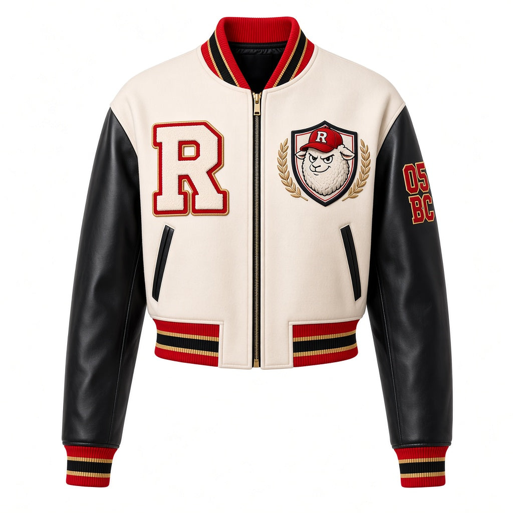 Cropped cream REALIGION Varsity Bomber with black sleeves, red and gold R patch, lamb crest with laurels, 05 BC sleeve and red, black and gold striped ribbing