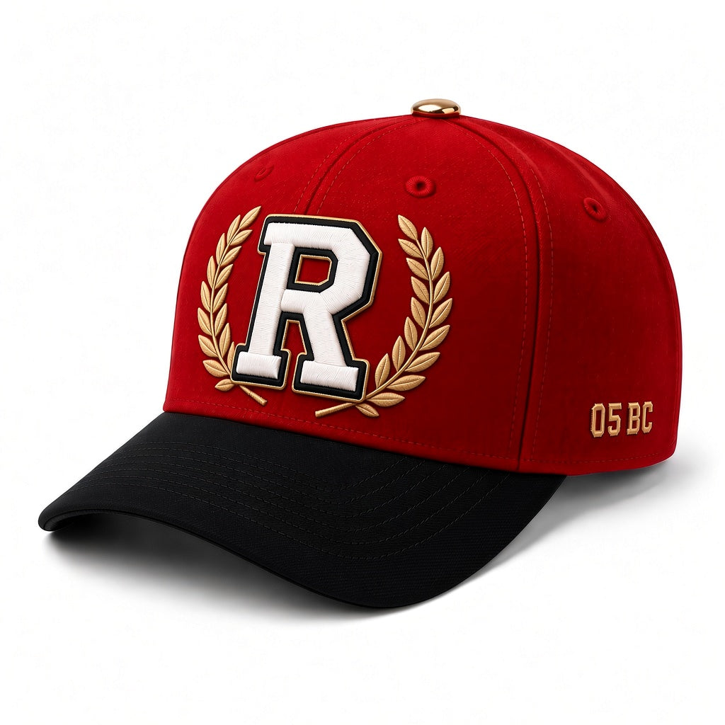REALIGION Varsity Wreath R Fitted Cap in red with black brim, raised cream R inside a gold laurel wreath and gold 05 BC side detail